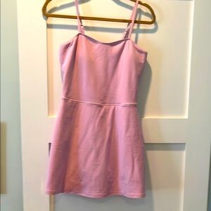 Light pink alo tennis dress!  Enjoy this athletic dress on or off the court!!